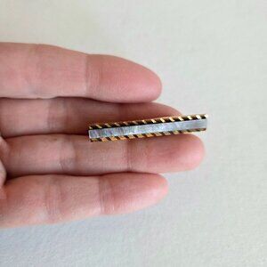 Vintage gold tone metal and mother of pearl tie clip bar or money clip. Signed.